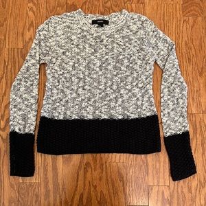 Pullover black and white sweater.